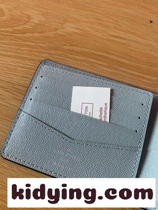 ルイヴィトン 財布 いくら 古典的なルイヴィトン法の文字を最初から反転させ,鮮やかなサンゴピンクで印刷した コピー-2