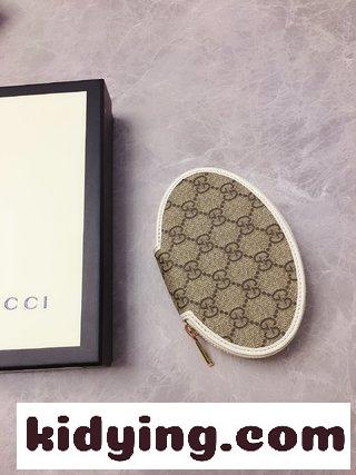 グッチ財布 売値 GG Supremeの高級人工帆布で作られたこの財布が新しく発売された Gucci 1955馬衔扣シリーズの装飾に力を加える コピー-1